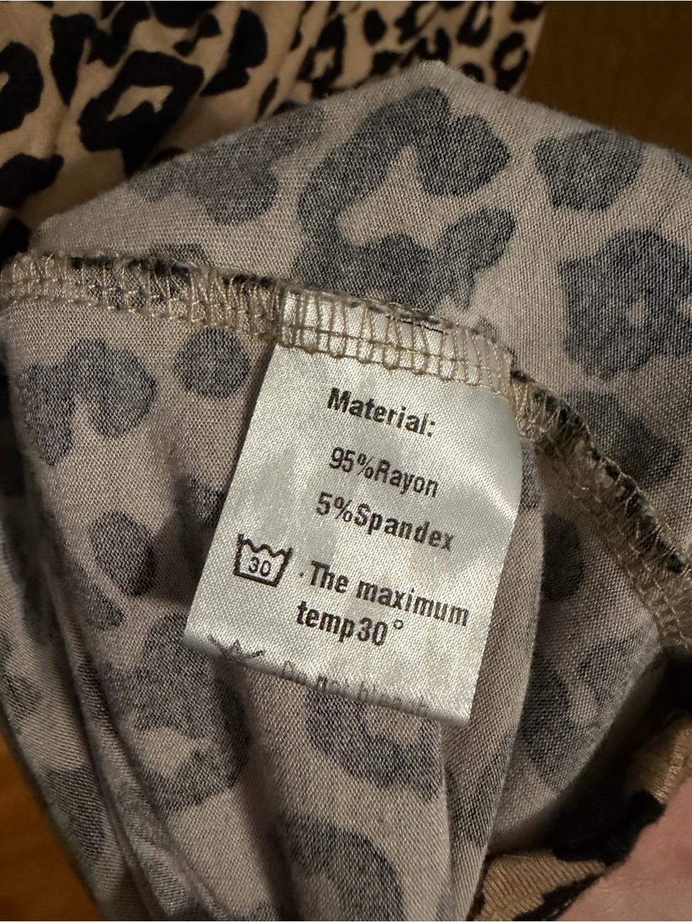 TASAMO Loose Ruffle Hem Top - Picture 5 of 5